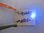 Handwritten, Soft Circuit Boards and Antennas Using Liquid Metal Nanoparticles